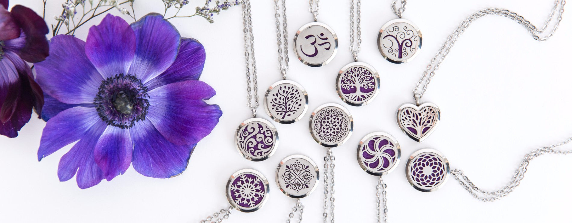Essential oil diffusing necklaces
