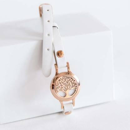 rose gold essential oil diffuser bracelet.  White leather strap aromatherapy jewellery.